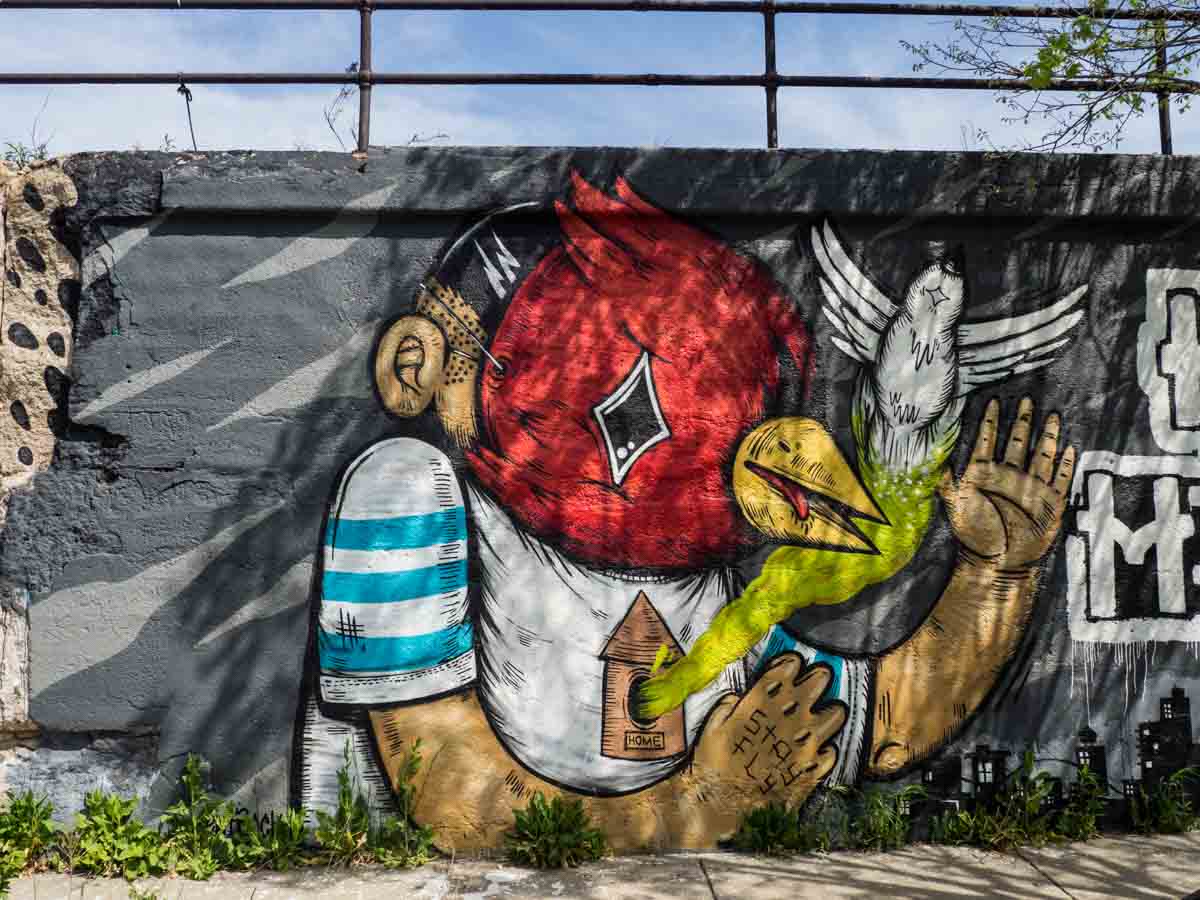 Sentrock artist Bird Mask street art in Pilsen Chicago