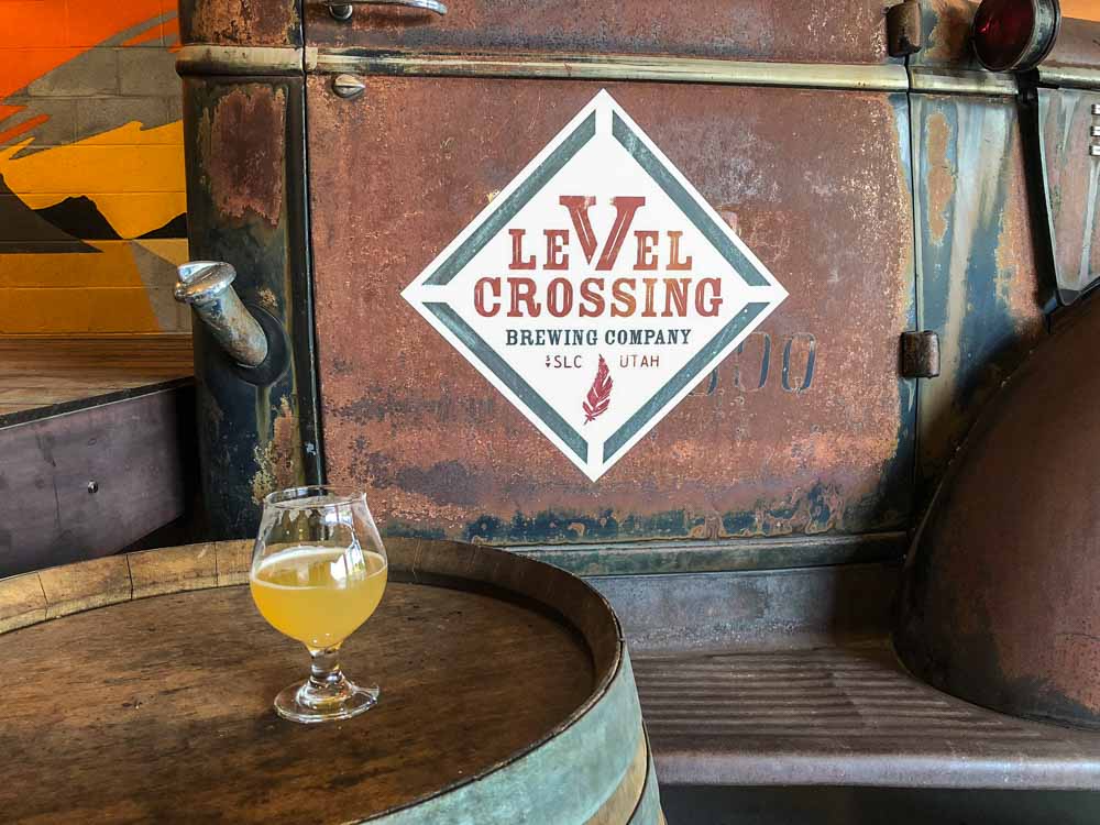 Salt Lake City Breweries: Level Crossing. Beer glass with brewery sign