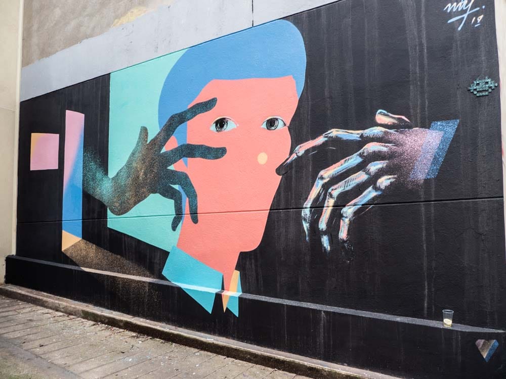 Belleville Paris street art mural by Txemy