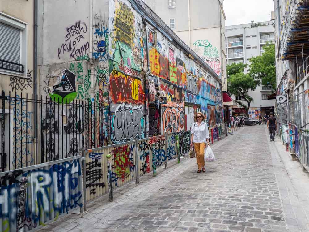 Graffiti alley in Paris Rue Denoyez