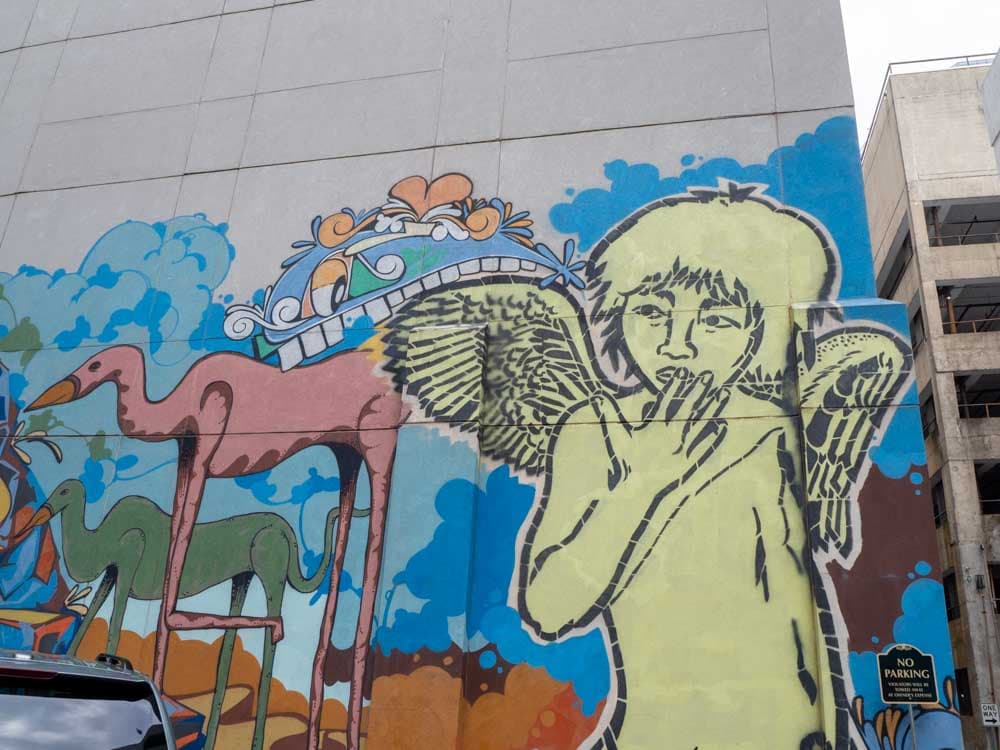 Angels & Monsters mural in Nashville- yellow angel figure