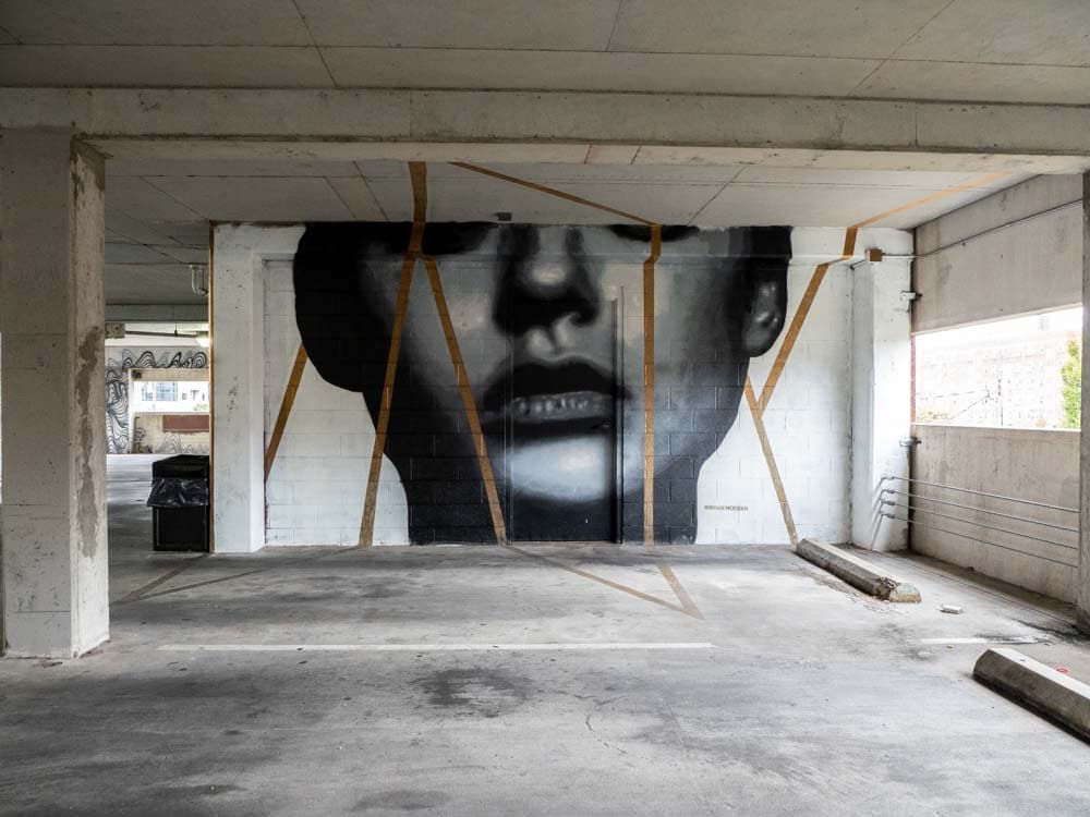 Brian Wooden mural Elliston parking garage- woman with gold stripes