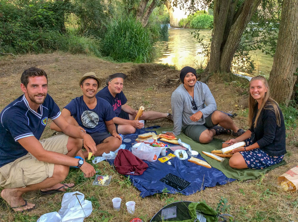 Camino de Santiago cost tips- picnic with pilgrims