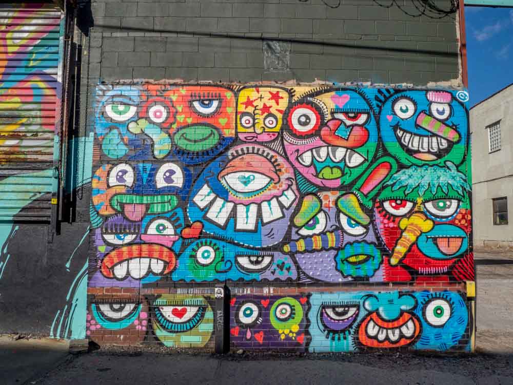Street artist Phetus monsters in Brooklyn