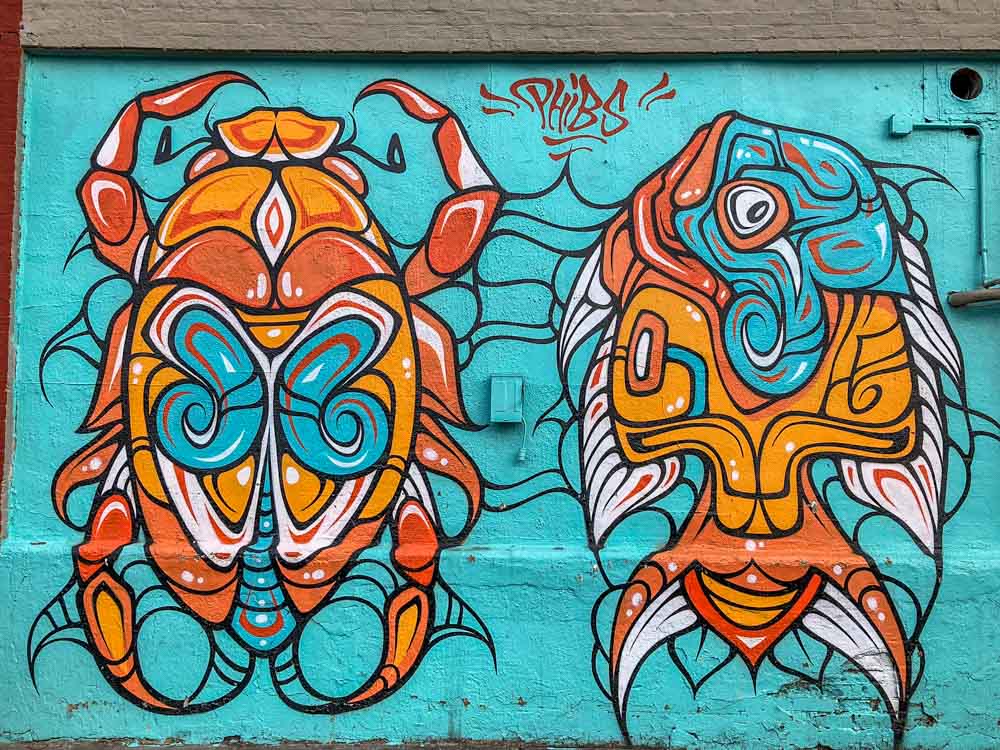 Phibs mural in Brooklyn blue and orange bugs