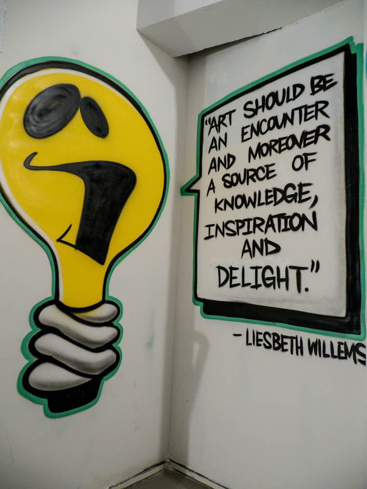 Street art NYC: MOSA mural light bulb by Meres One