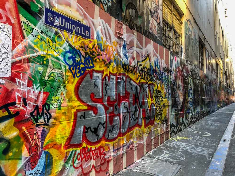 Graffiti Melbourne: Union Lane. Red and yellow lettering