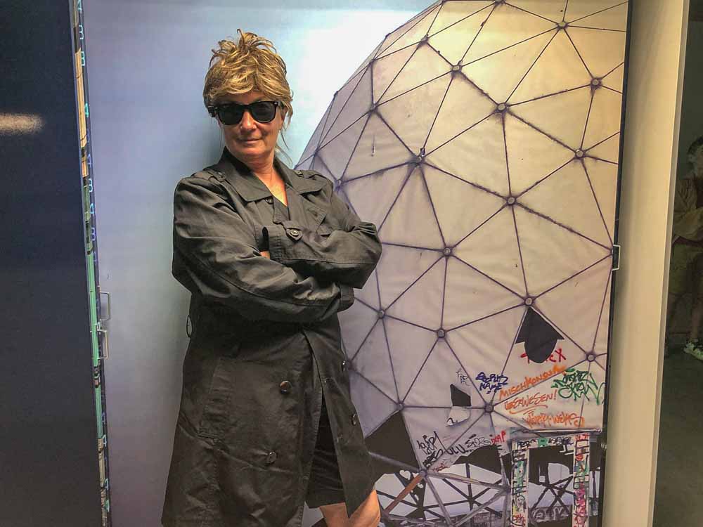 what to do in Berlin- German spy museum- woman with wig and trenchcoat