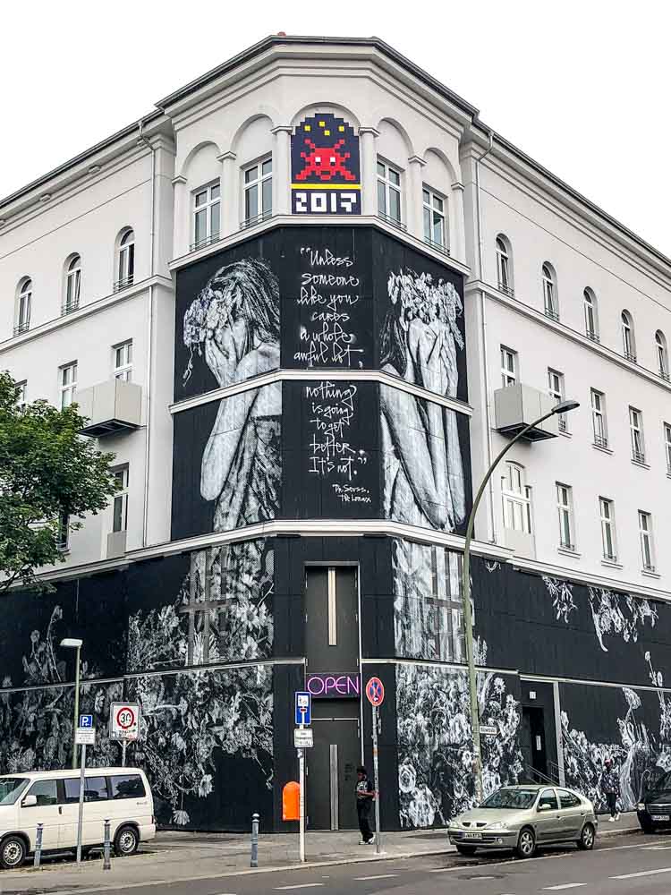 Urban Nation Street Art Museum Berlin with black street art stencil on the exterior