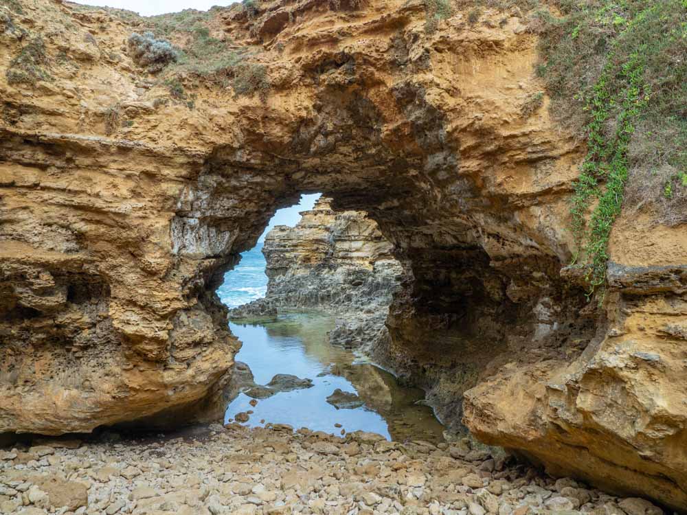 Australia's Great Ocean Road landscape: The Grotto. Limestone hole with ocean water reflections