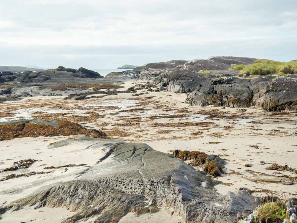 Ring of Kerry Ireland Derrynane beach. Rocks and sand dunes
