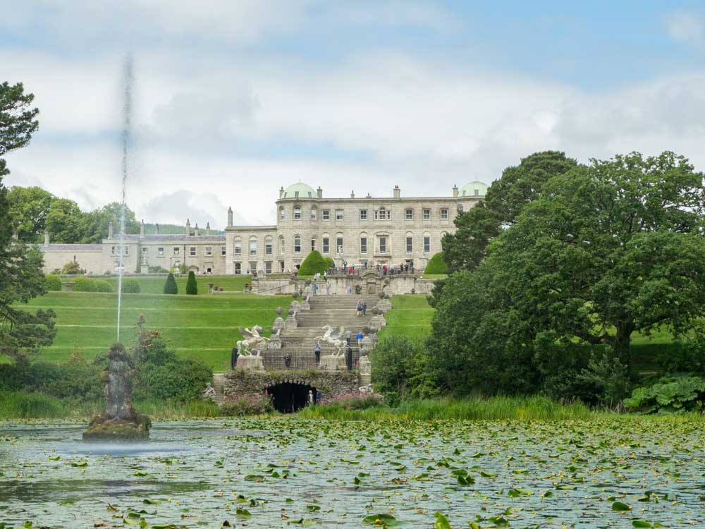 Powerscourt gardens near Dublin Ireland. Manor house with fountain and walkways