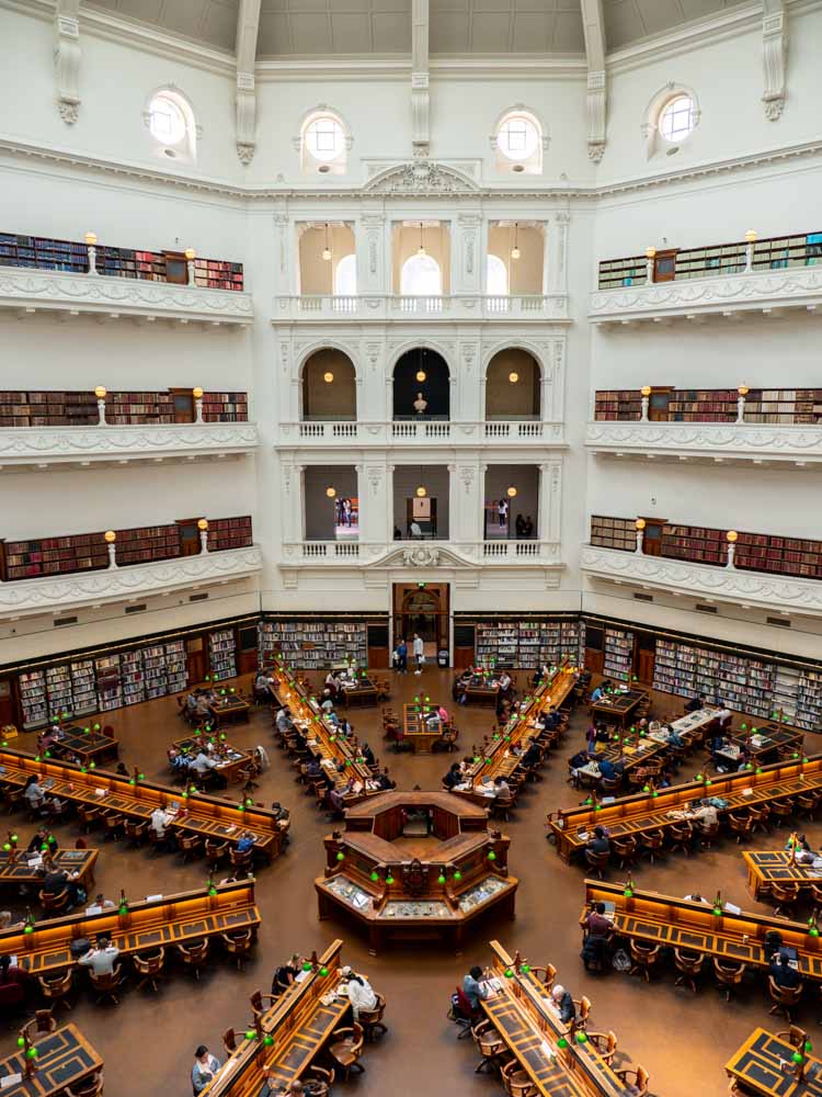 Beautiful libraries: Australia Melbourne central library. rotunda and reading tables in a large room