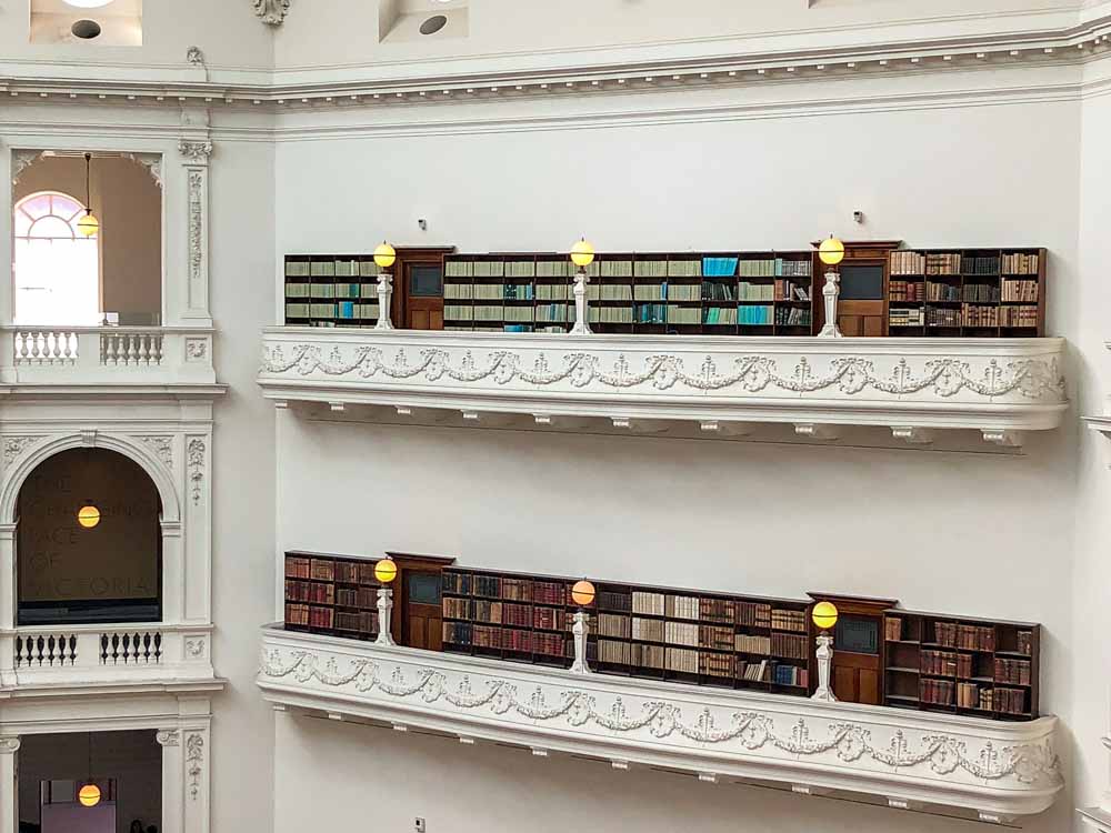 Victoria Melbourne state library special collections. white walls and bookshelves