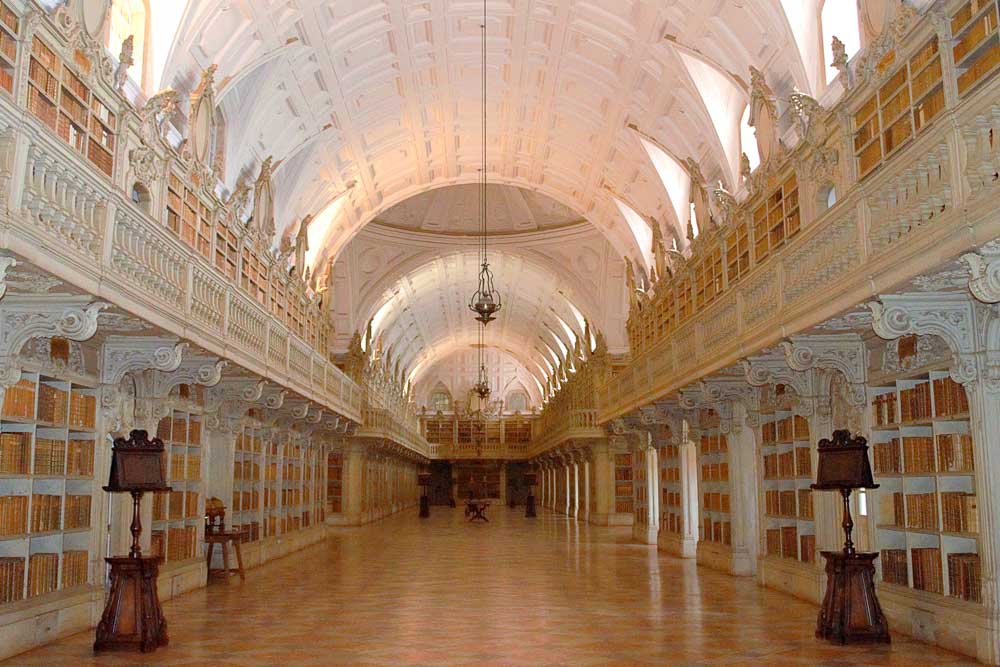 Beautiful libraries around the world: Biblioteca do Convento de Mafra Mafra Palace library with domed ceiling and shelves