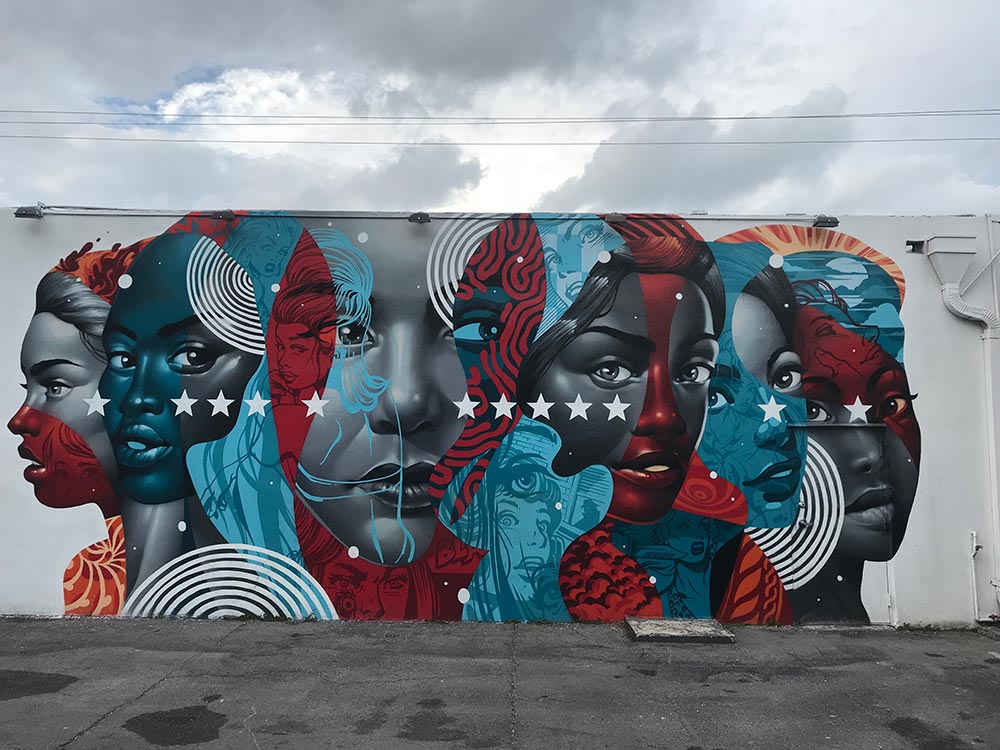 Miami Wynwood Walls mural by Tristan Eaton. Blue and red faces