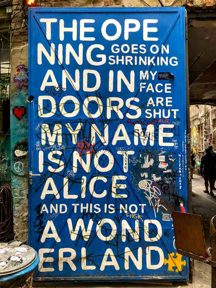 Berlin Rosenthaler strasse Alice in Wonderland sticker
