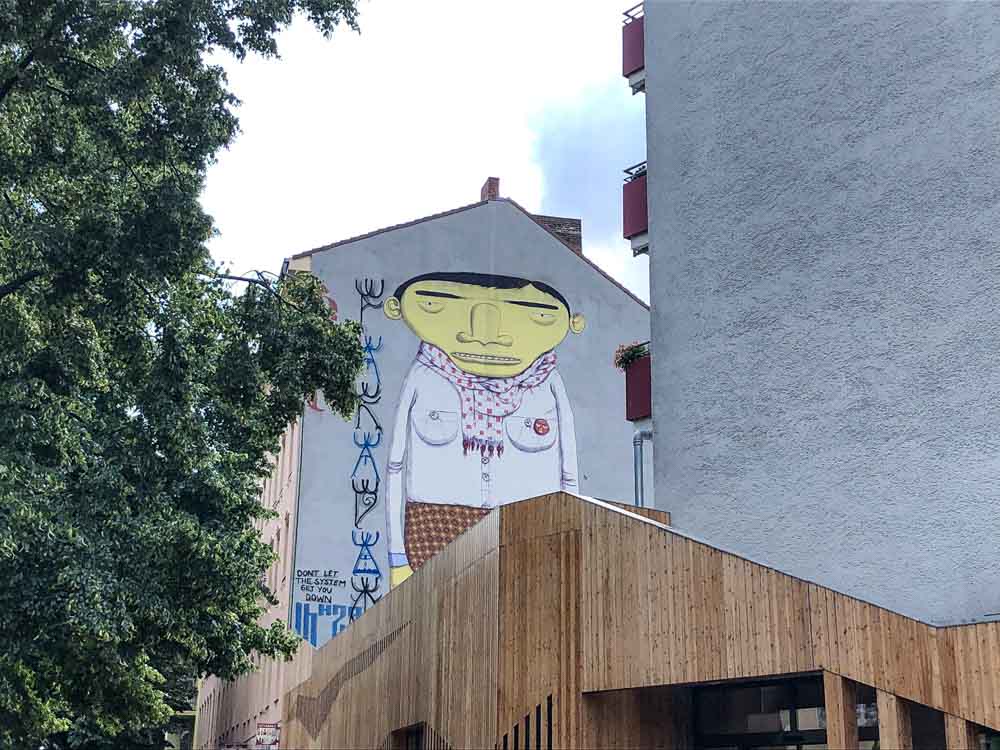 Berlin kreuzberg mural Os Gemeos