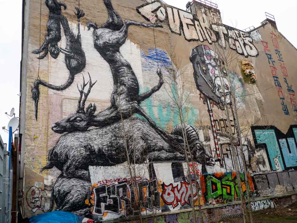 Roa mural in Kreuzberg Berlin. Elk and storks on a wall