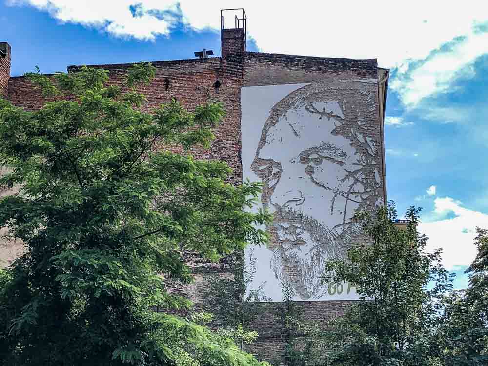 Vhils mural in Berlin- Go Forth