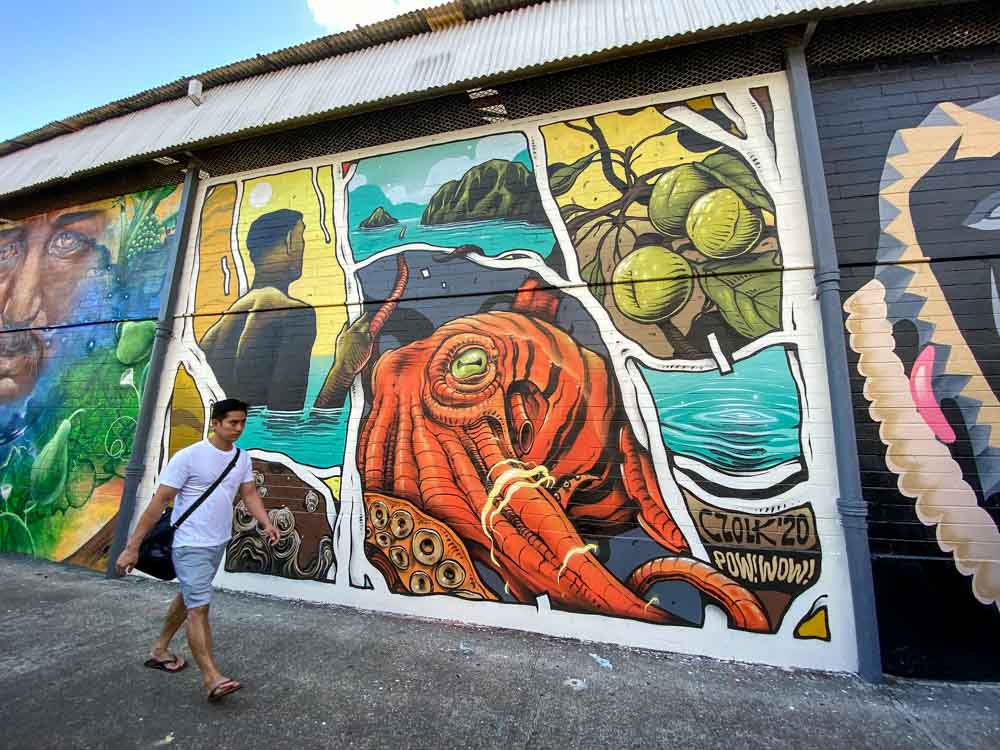 Czolk mural in Honolulu for POW!WOW! 2020. Orange sea creature
