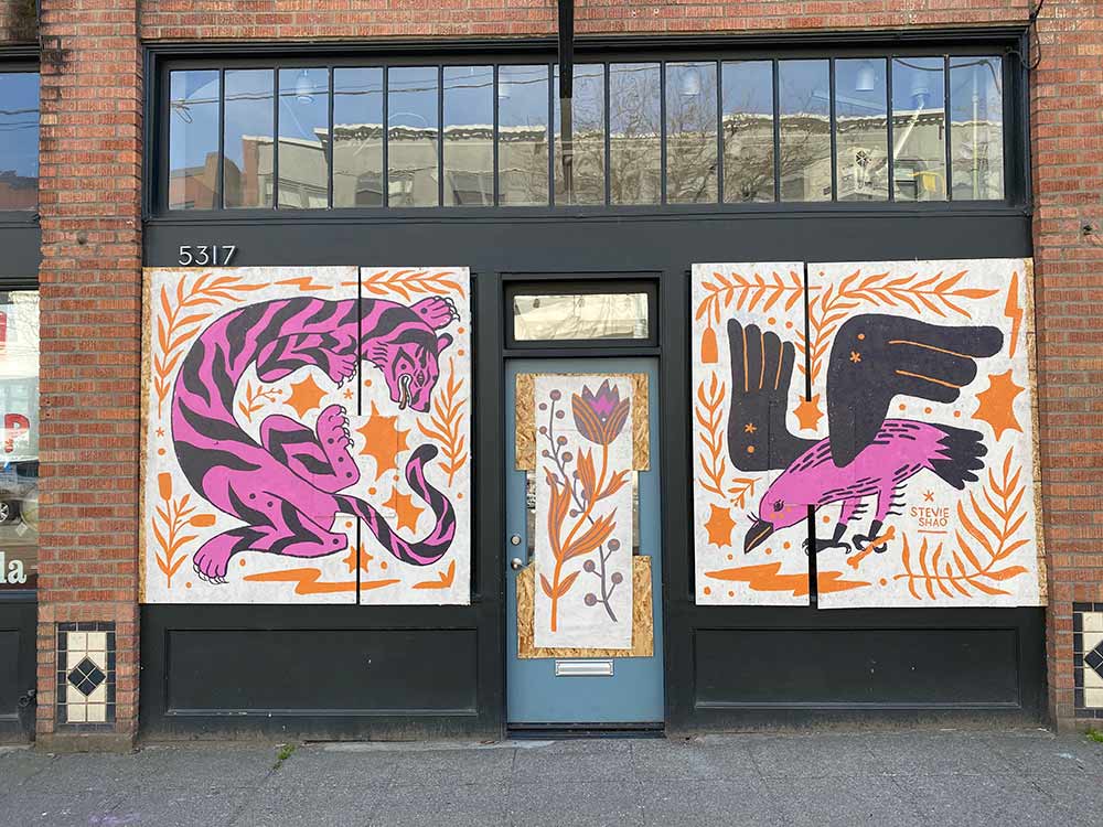 Seattle coronavirus street art Stevie Shao. pink and blue flowers