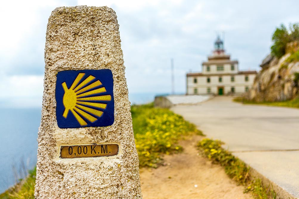 10 Great Camino de Santiago Movies: Motivation, Inspiration & Perspiration Camino de Santiago finesterre sign