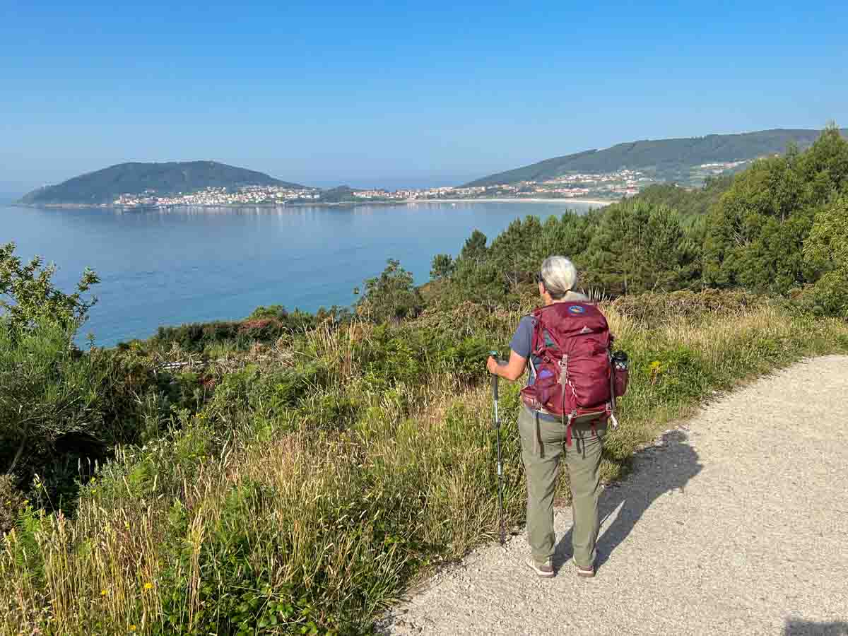 Camino de Santiago Corcubion view. Finesterre route with hiker