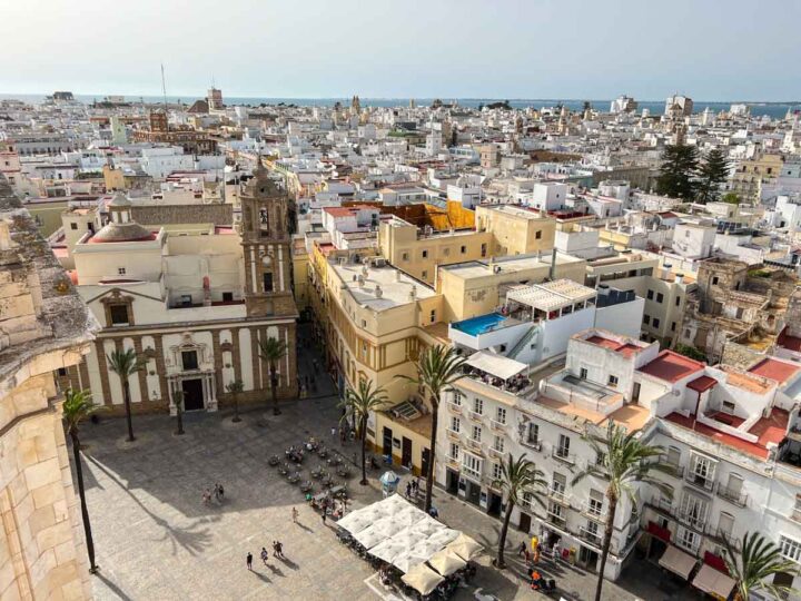 Cadiz day trip view of Cathedral square with old buildings.