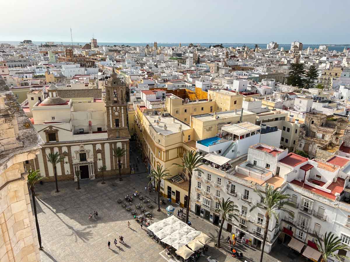 Cadiz day trip view of Cathedral square with old buildings.